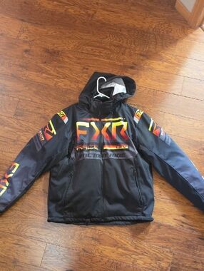 Fox Black Jacket with Red and Yellow FXR Graphics